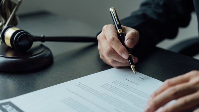 commercial real estate attorney signing lease agreement